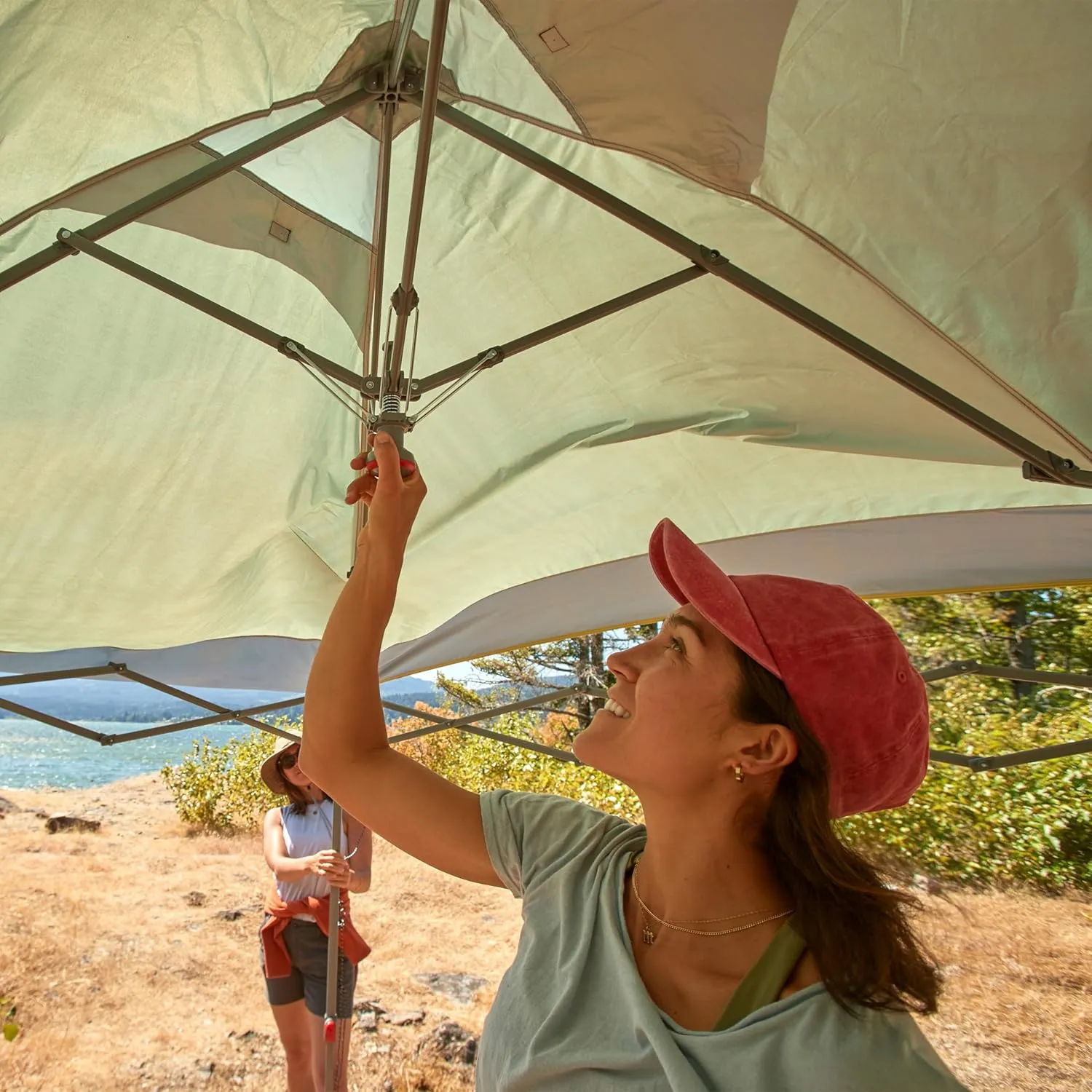 Coleman Oasis Instant Pop-Up Canopy Tent with Side Wall Attachment 10x10ft/13x13ft Portable Shelter with One-Push Setup & Takedown Robust Frame with Wheeled Carry Bag