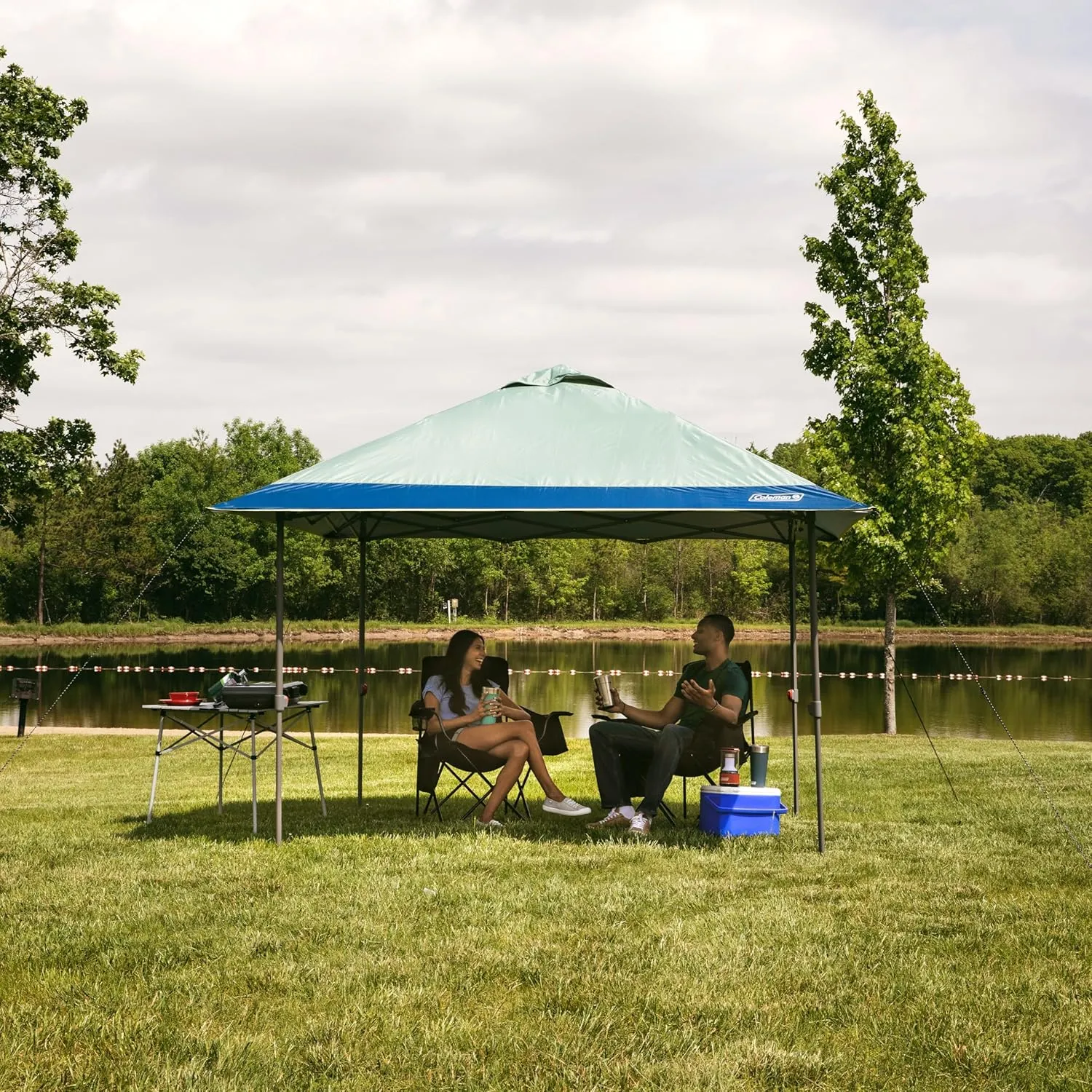 Coleman Oasis Instant Pop-Up Canopy Tent with Side Wall Attachment 10x10ft/13x13ft Portable Shelter with One-Push Setup & Takedown Robust Frame with Wheeled Carry Bag