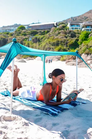 SUN NINJA Baby Pop-up Beach Tent, UPF50  Beach Shade Canopy, Sun Shelter with Carry Bag, Ground Pegs and Stability Poles, Outdoor Shade for Camping, Fishing, Backyard Fun or Picnics (Turquoise)